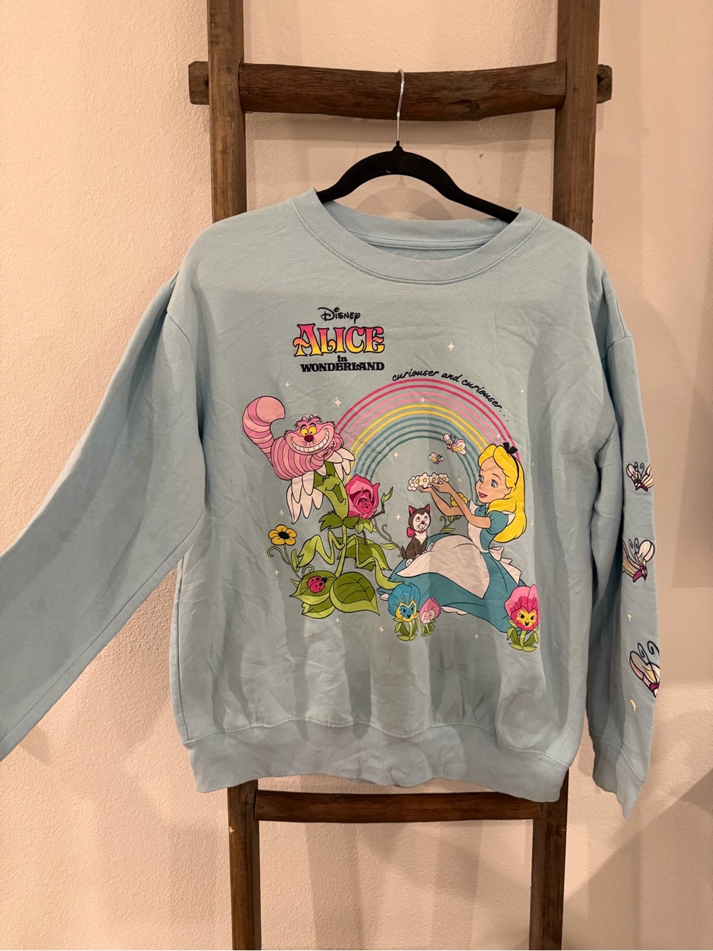 Disney Alice in Wonderland Pastel Blue Kids Sweatshirt with Rainbow Graphic